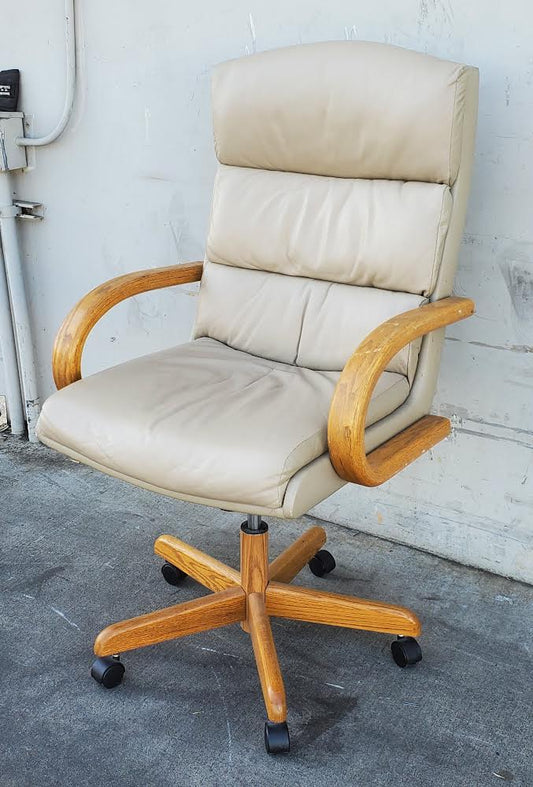 beige/tan office/computer chair on wheels