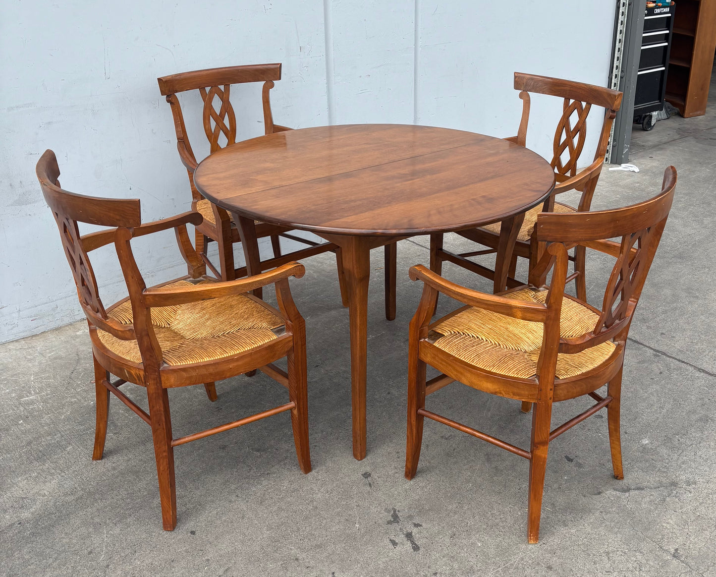 S. Cavallo inc. round table with 4 chairs wicker seats