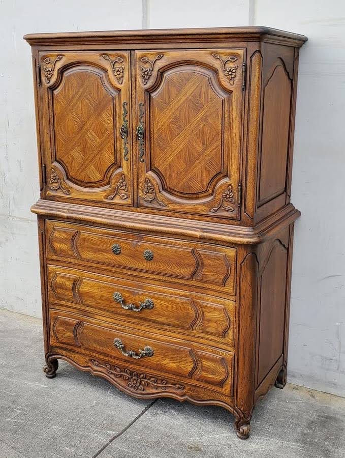Thomasville carved French Provincial armoire