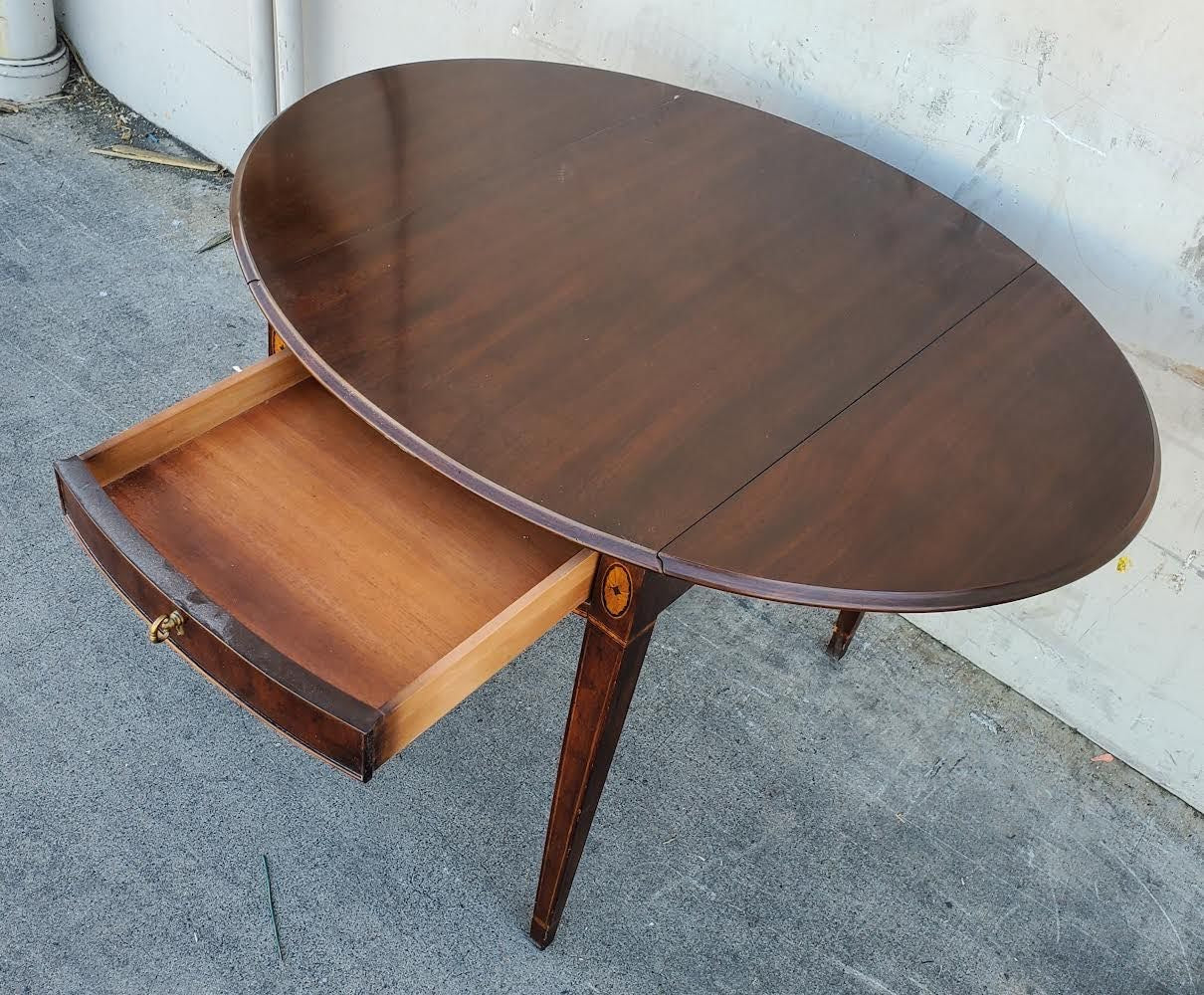 Oval end/side table with drawer drop sides