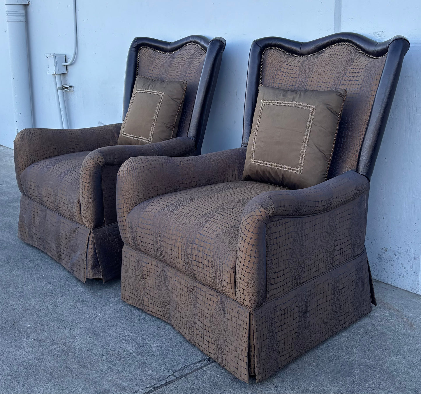 A. R. T. Brown armchairs