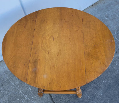round table with drop leaf sides