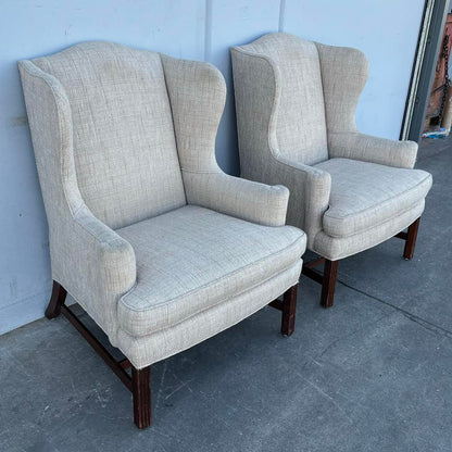 Pair Wing Chairs with High Exposed Wood Leg