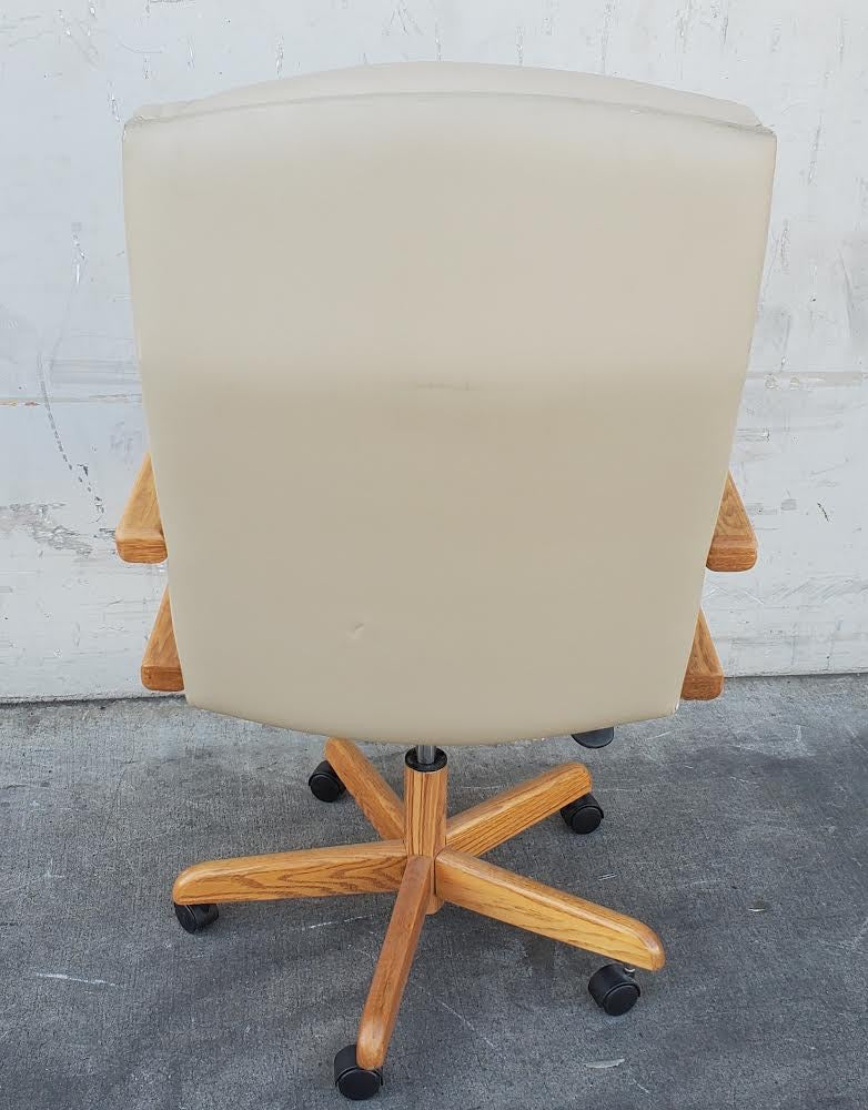 beige/tan office/computer chair on wheels