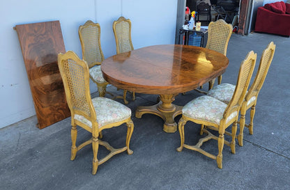 Dining table with 6 wicker high back chairs and leaf