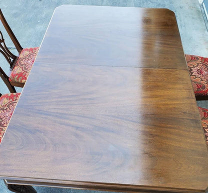Antique/vintage dining table with 4 chippendale style chairs red floral cushions