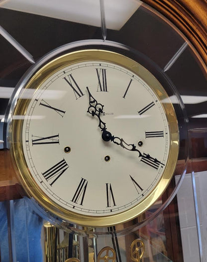 howard miller grandfather clock with curio