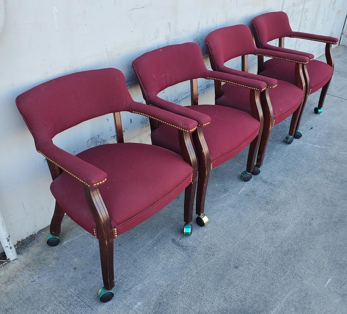 Burgundy Captain guest chairs with casters (4)