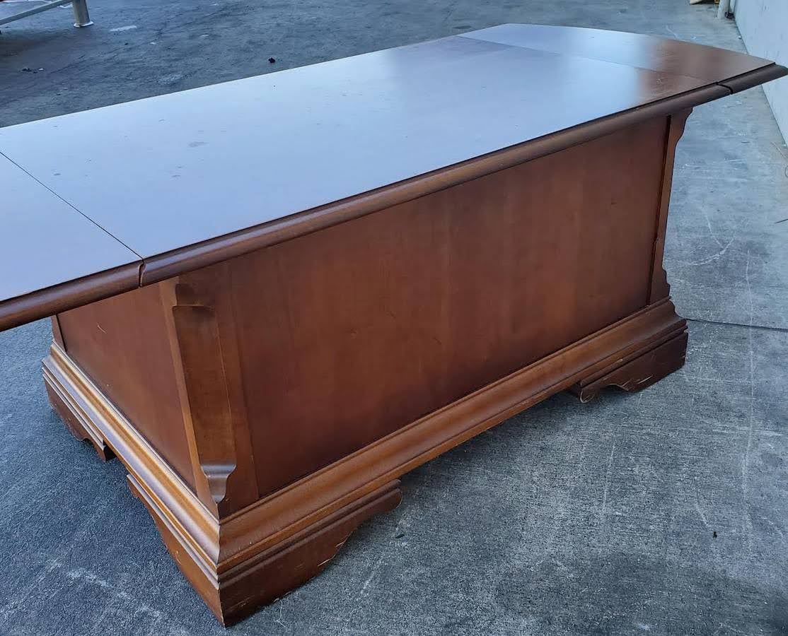 Broyhill coffee table with 2 drawers and side drop down extensions