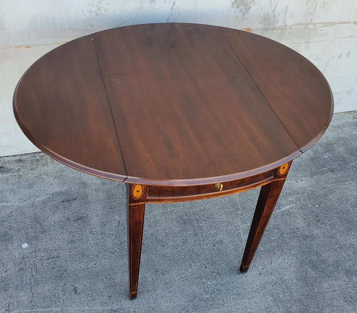 Oval end/side table with drawer drop sides