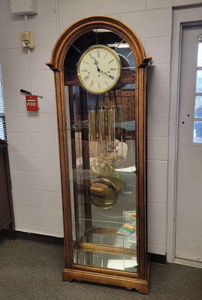 howard miller grandfather clock with curio