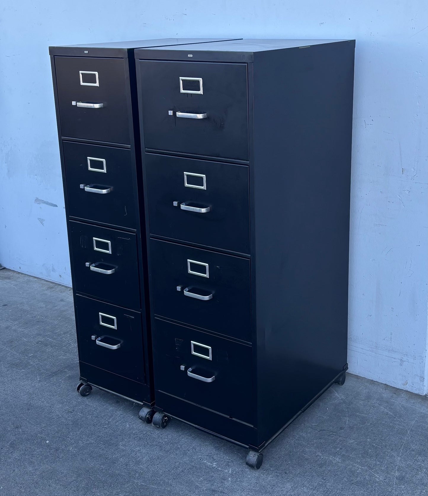 Hon 2 black file cabinets 4 drawer on wheels