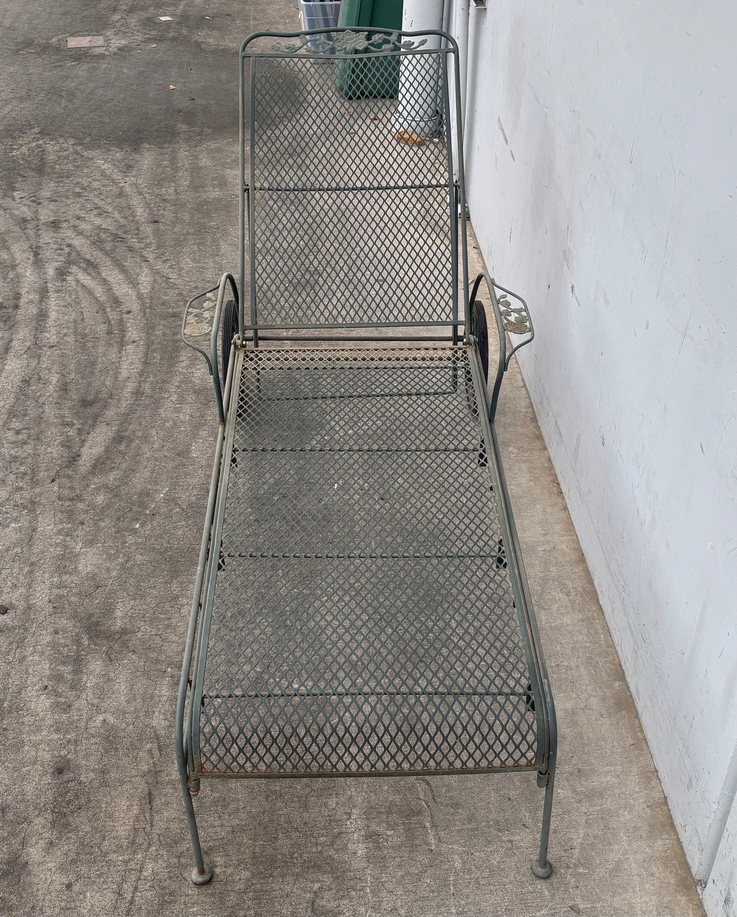 Vintage Wrought iron flower patter garden chaise lounge chair with wheels