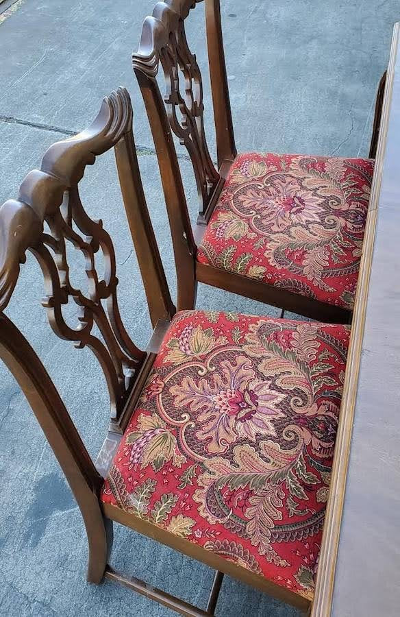 Antique/vintage dining table with 4 chippendale style chairs red floral cushions