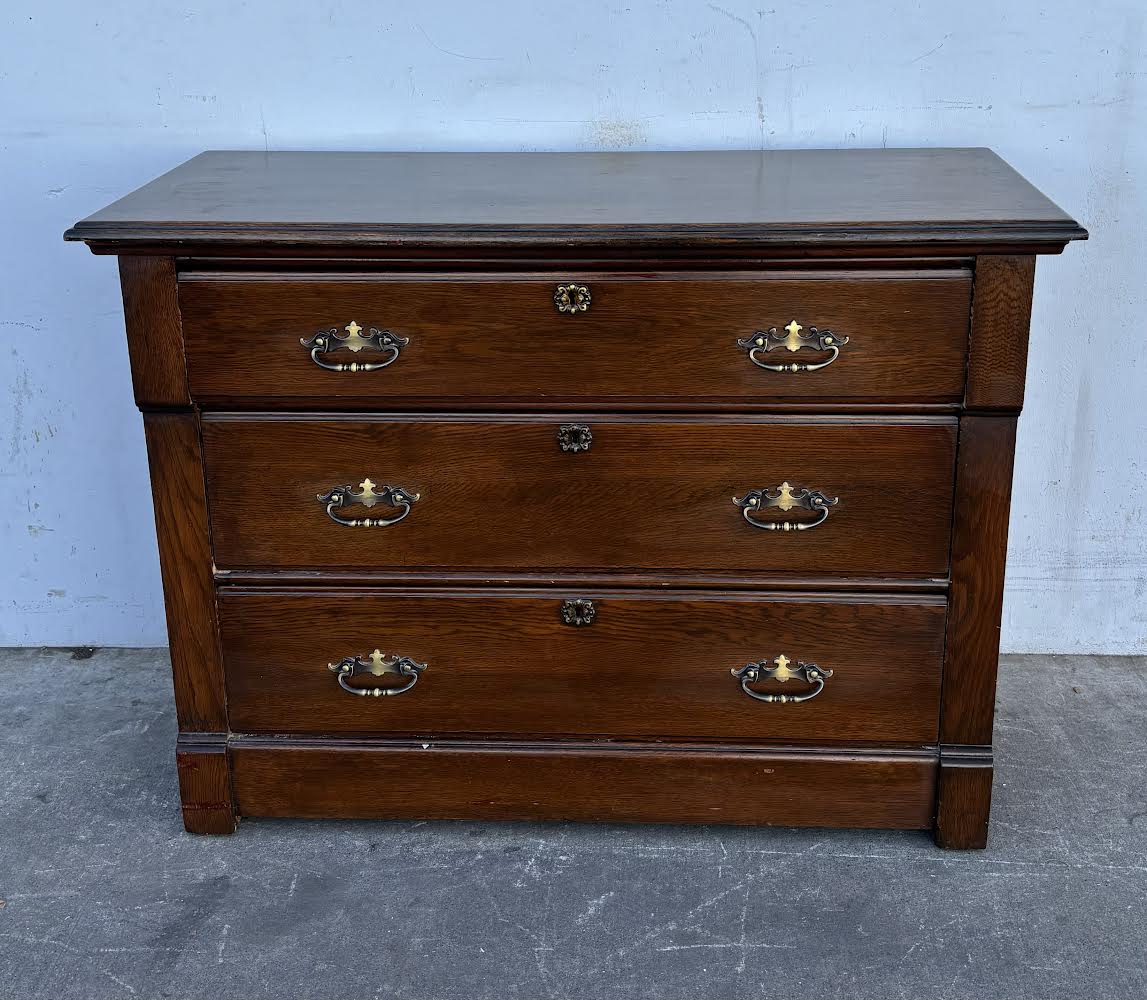 Dark wood dresser/ chest of drawers