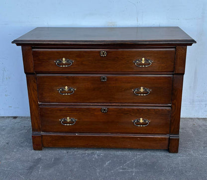 Dark wood dresser/ chest of drawers