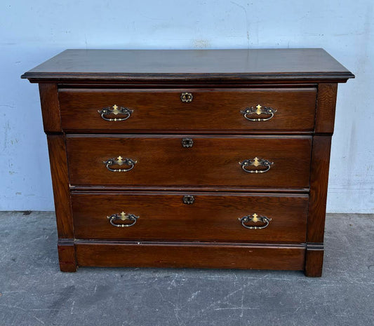 Dark wood dresser/ chest of drawers