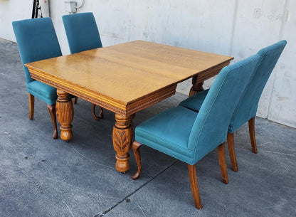 Dining Table with 4 blue chairs and 2 leaves