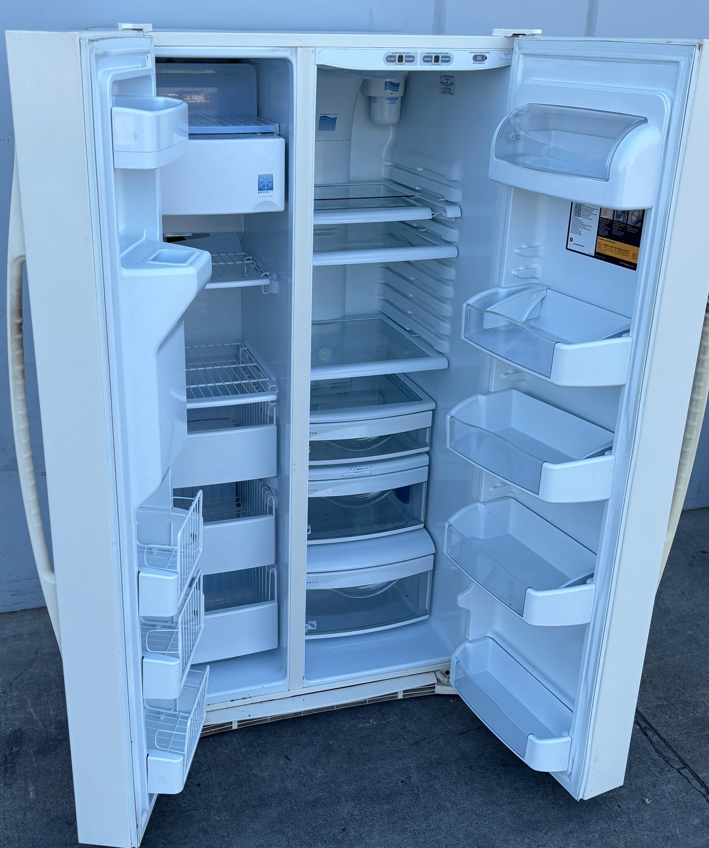 GE profile arctica white side by side refrigerator