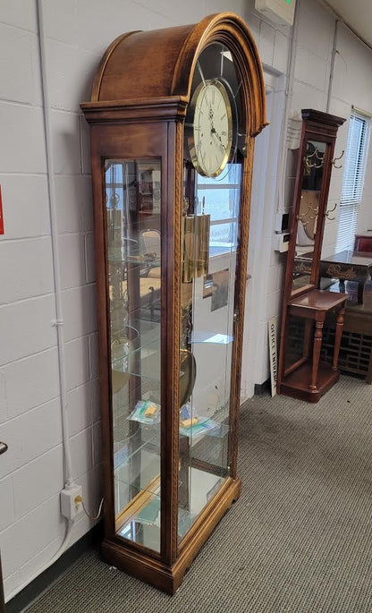 howard miller grandfather clock with curio