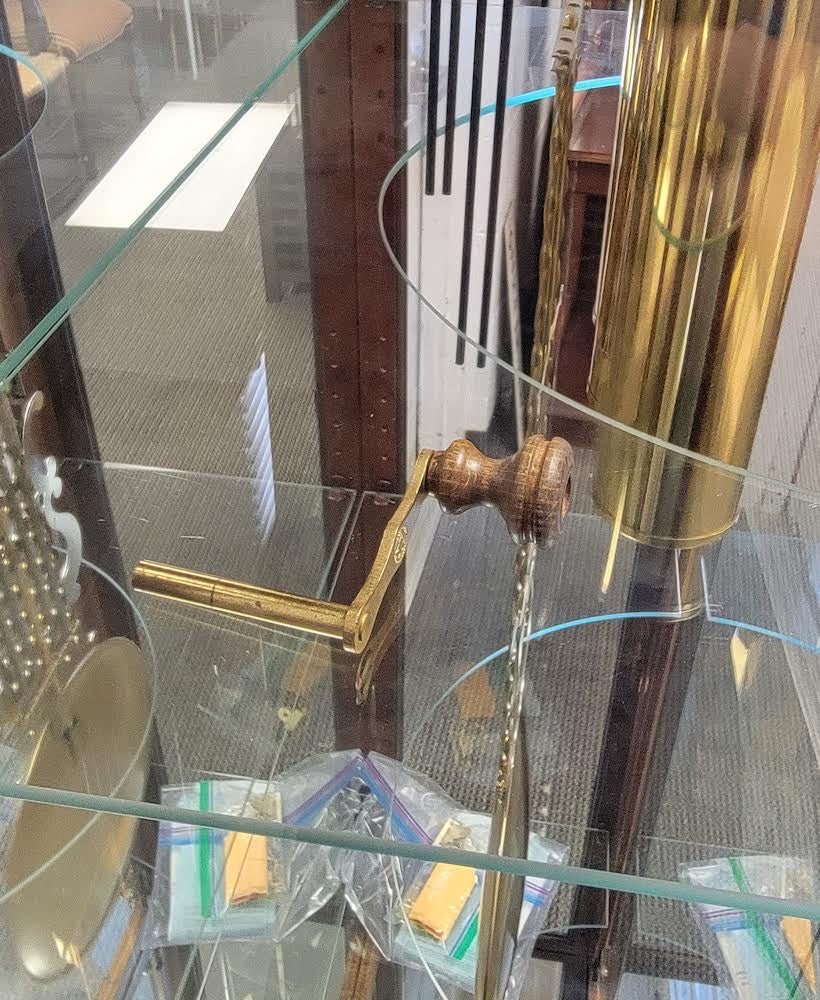 howard miller grandfather clock with curio