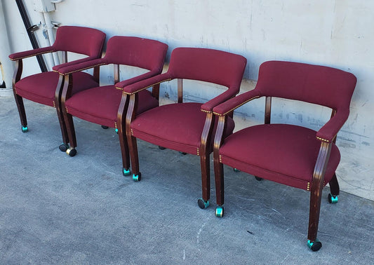 Burgundy Captain guest chairs with casters (4)