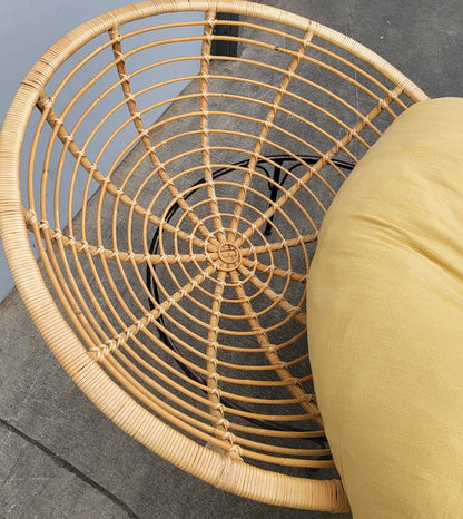 green papasan chair with footstool