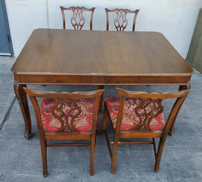 Antique/vintage dining table with 4 chippendale style chairs red floral cushions