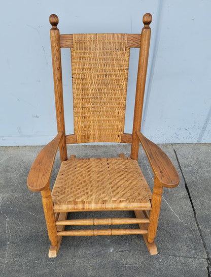 Wicker/ cane/ rattan rocking armchair antique/ vintage light wood