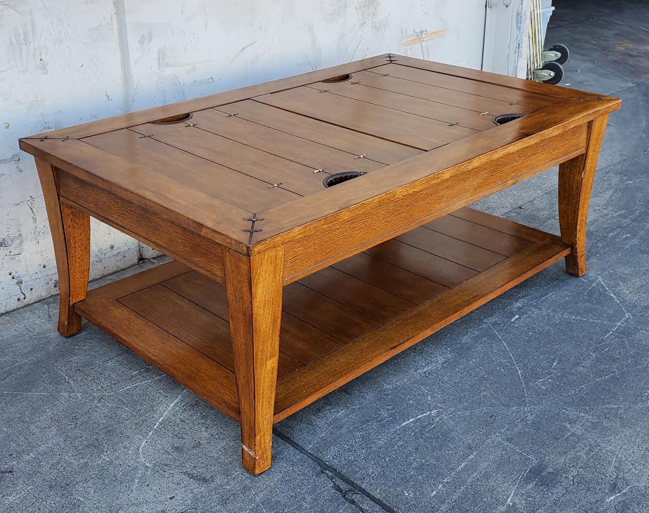 wood coffee table with storage compartments on top
