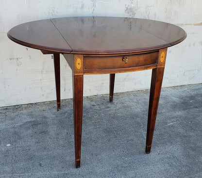 Oval end/side table with drawer drop sides
