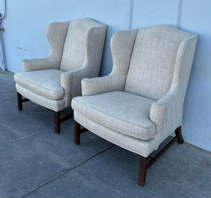 Pair Wing Chairs with High Exposed Wood Leg
