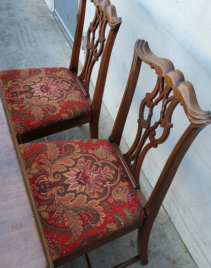 Antique/vintage dining table with 4 chippendale style chairs red floral cushions