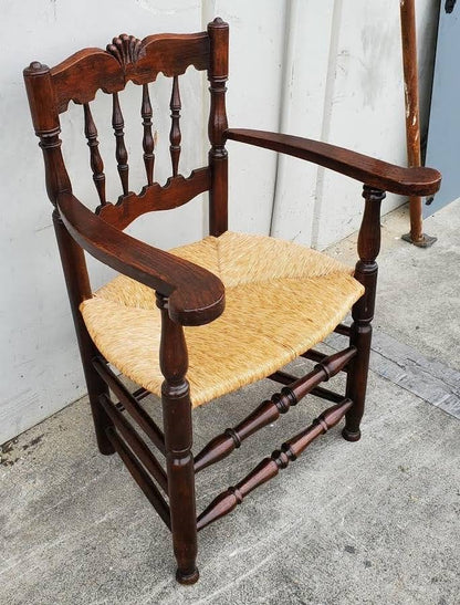Armchair wicker seat dark wood