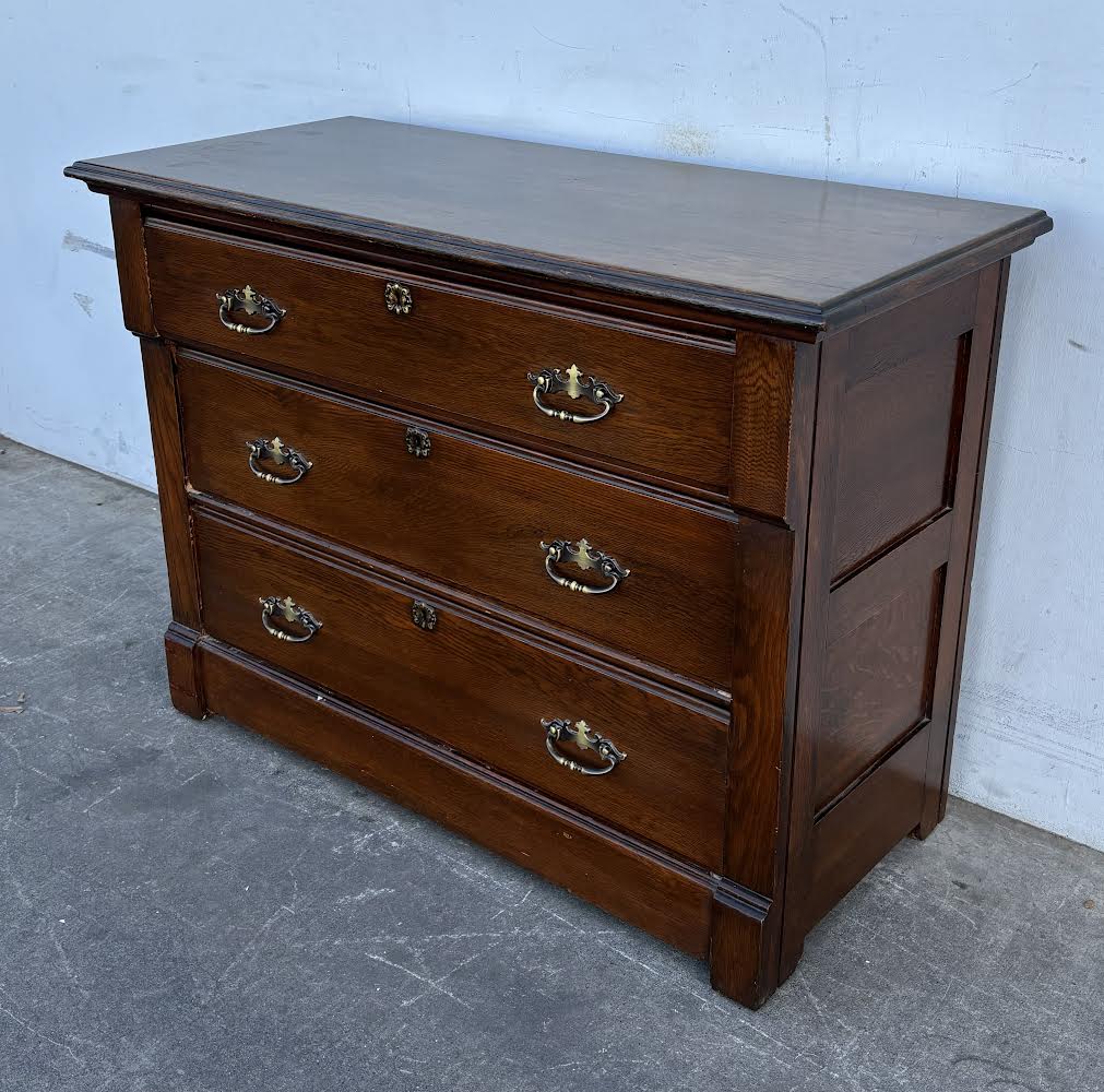 Dark wood dresser/ chest of drawers