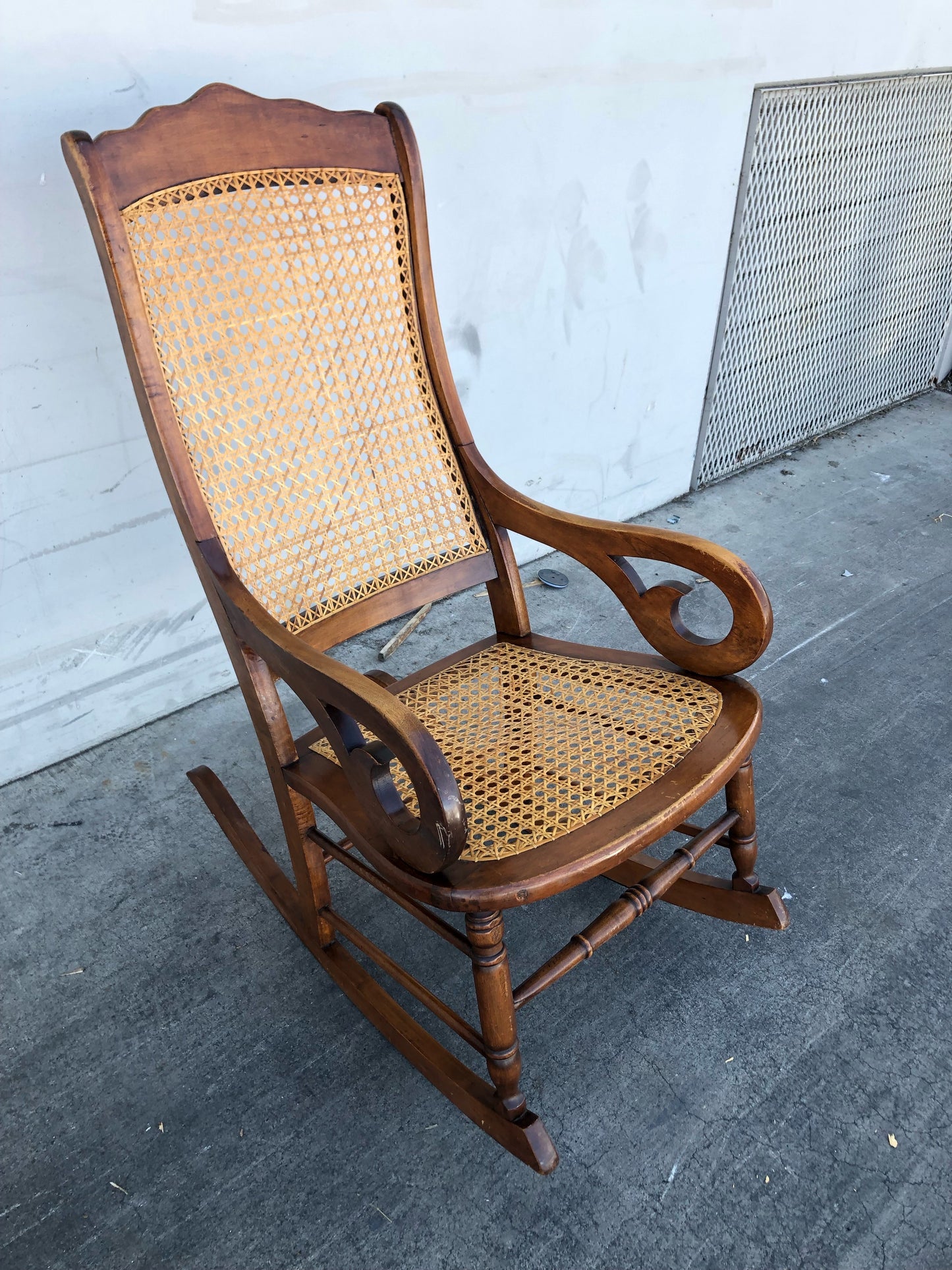 Wicker/cane/rattan vintage rocking chair