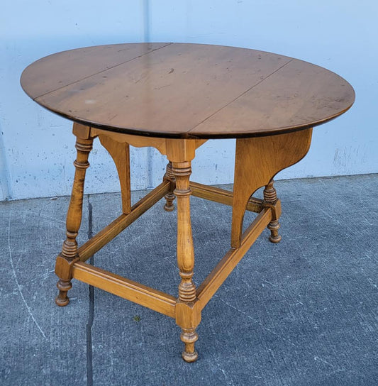 round table with drop leaf sides