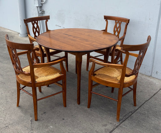 S. Cavallo inc. round table with 4 chairs wicker seats