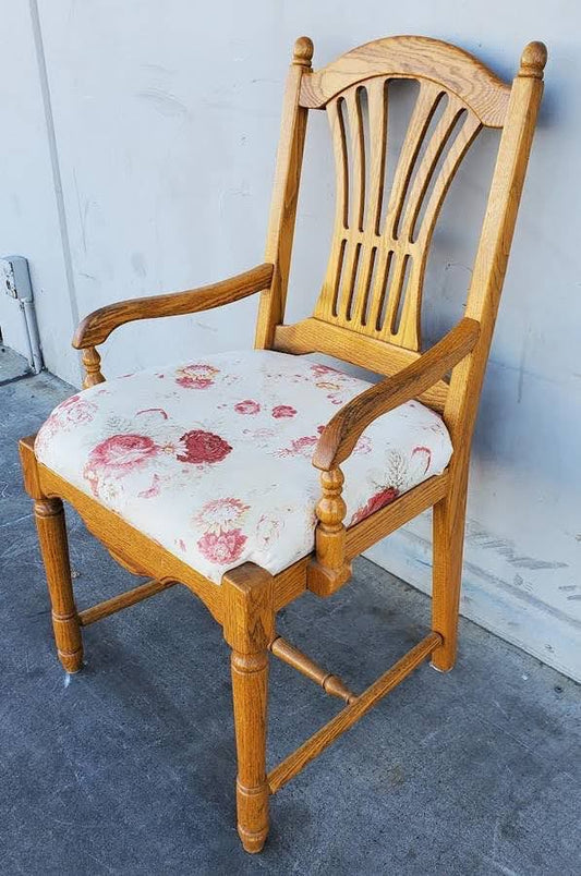 Light wood armchair white floral cushion