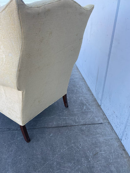 beige/cream armchair